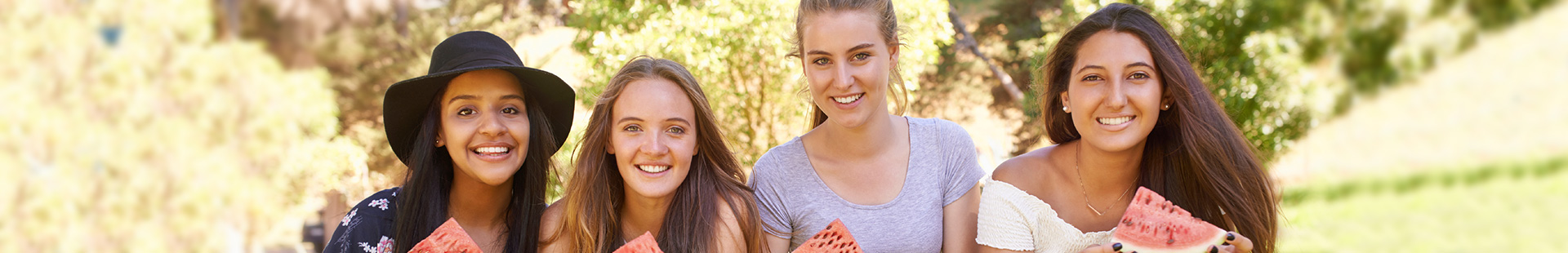 friends eating watermelon